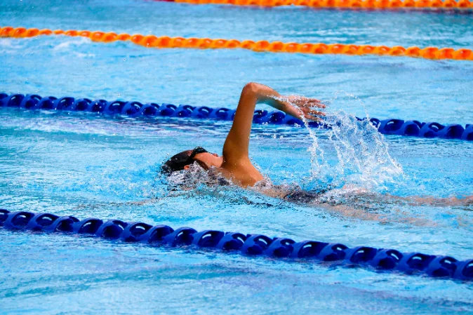 Masters swimmer mid-stroke